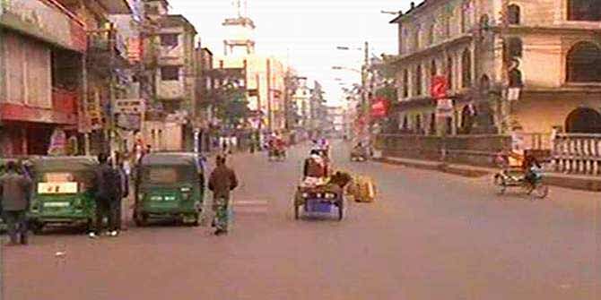Few CNG-run auto rickshaws and vans are seen on the Sylhet city road Thursday morning during a dawn-to-dusk hartal enforced by Jamaat-e-Islami. The party called the hartal protesting its Ameer Motiur Rahman Nizami's death sentence in 10-truck arms haul case. Photo: TV grab