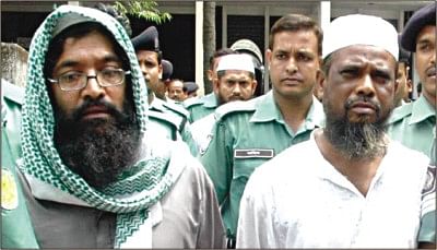 In this April 16, 2009 Star file photo, Harkatul Jihad leaders Maulana Abu Taher and Mufti Hannan being taken to a Dhaka court under heavy security for charge-framing in the Ramna Batamul case. 