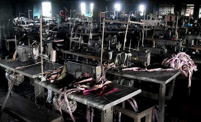 This November 29, 2012 file photo shows the charred machines after a devastating fire that killed 112 workers at Tazreen Fashions in Ashulia, on the outskirts of the capital, Dhaka.
