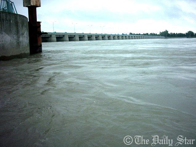 Sources at the Water Development Board, Dinajpur, say all the 44 sluice gates of the Teesta barrage have been kept open to cope with the situation. Photo: Star