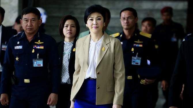 PM Yingluck Shinawatra is under intense pressure to step down and make way for an interim government. The photo is taken from BBC website.
