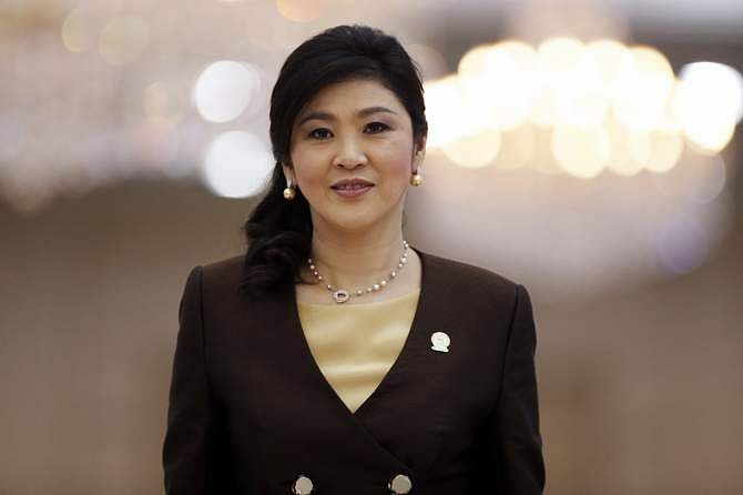 Thailand's Prime Minister Yingluck Shinawatra leaves the Plenary session of the 21st ASEAN (Association of Southeast Asian Nations) and East Asia summit in Phnom Penh, in this November 20, 2012 file picture. Photo: Reuters