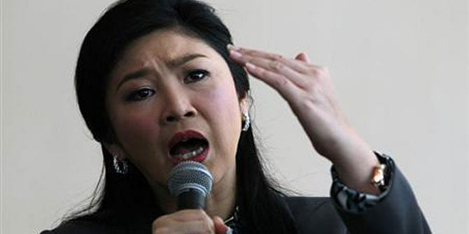 Thailand's Prime Minister Yingluck Shinawatra speaks during a news conference at the Permanent Secretary of Defence in Bangkok January 17, 2014. 