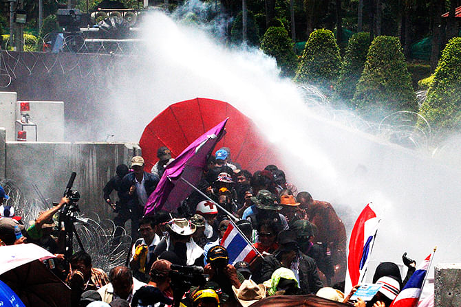 Protesters faced tear gas and water cannons as they targeted a government building. Photo: Reuters