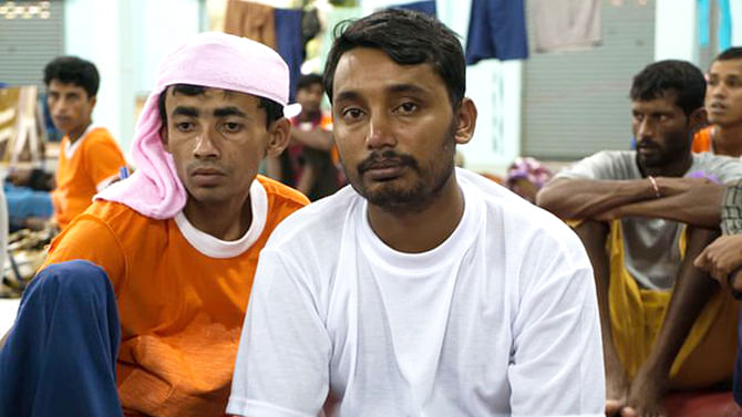 Absar Mia (C) hopes to return to his family in Bangladesh after his rescue from traffickers. Photo: BBC
