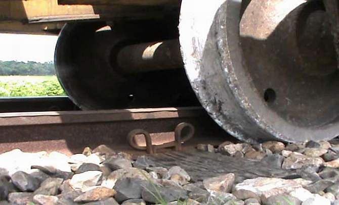 In this November 2, 2013 file photo, wheels of a compartment of a Chittagong-bound train from Sylhet derailed in Comilla halting train service on Dhaka-Chittagong and Dhaka-Sylhet routes.