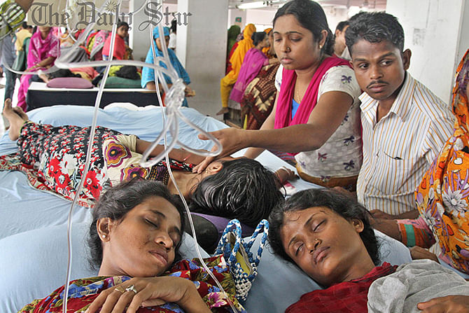 At least 30 workers have so far fallen sick as the staff of five factories under Tuba Group started the hunger strike on the sixth floor of the factory housed at Hossain Market in Uttar Badda in the capital since the Eid day. Photo: Amran Hossain