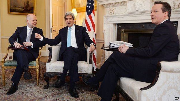 US Secretary of State John Kerry (centre) met British Prime Minister David Cameron and Foreign Secretary William Hague ahead of talks with Sergei Lavrov
