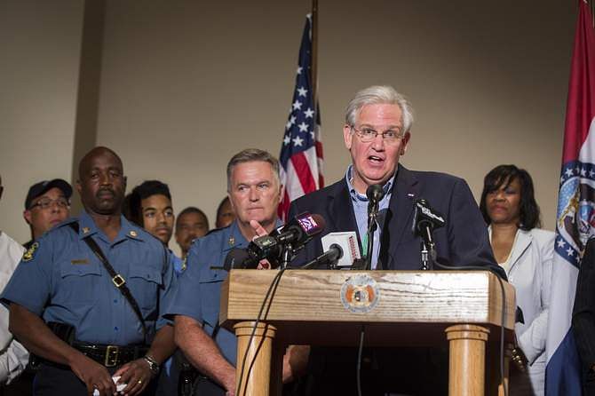 Missouri Governor Jay Nixon declares a state of emergency and curfew in response to looting the previous night in Ferguson, Missouri August 16, 2014. Photo: Reuters