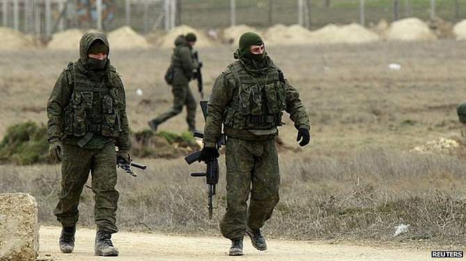 Pro-Russian troops have sealed off naval and other military bases in Crimea
