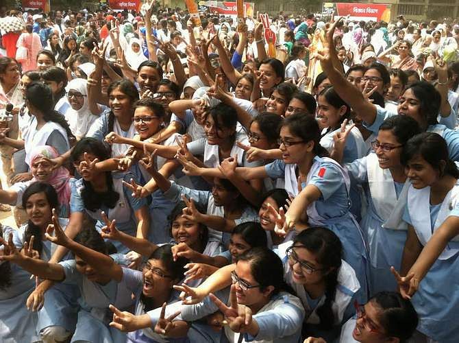 Students of Viqarunnisa Noon School and College celebrate after Secondary School Certificate (SSC) results have been published Saturday. Photo: Rashed Shumon