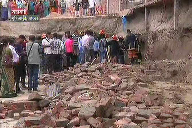 The TV grab shows the spot where two construction workers killed at Munshibari area at Badda in the capital Saturday. Photo: TV grab