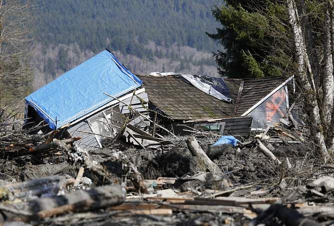 A landslide and structural debris blocks Highway 530 near Oso, Washington March 23. Photo: Reuters