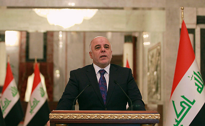 Iraq's Prime Minister-designate Haider al-Abadi speaks during a news conference in Baghdad August 25, 2014. Abadi on Monday predicted a "clear vision" on a new government would emerge within the next two days, state television reported, as the country faces deepening sectarian conflict. Photo: Reuters