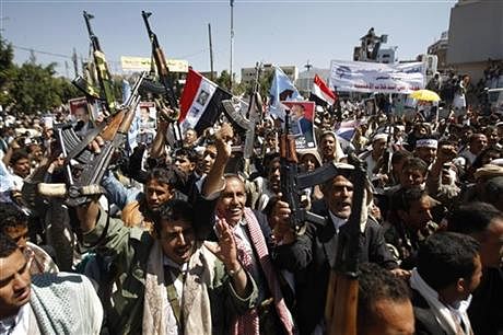 Supporters of Yemen's ousted President Ali Abdullah Saleh chant slogans to express their rejection of US Ambassador Matthew H. Tueller during demonstration against foreign interference in Sanaa, Yemen, Friday, 7 November, 2014. Photo: AP