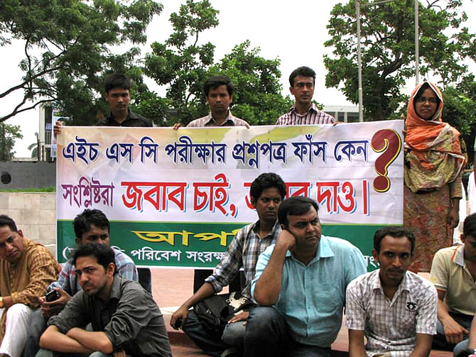 1.	Protesters form a sit-in against the recent allegations of question paper leak in public examinations at the Central Shaheed Minar in the capital on Friday. Photo: Courtesy